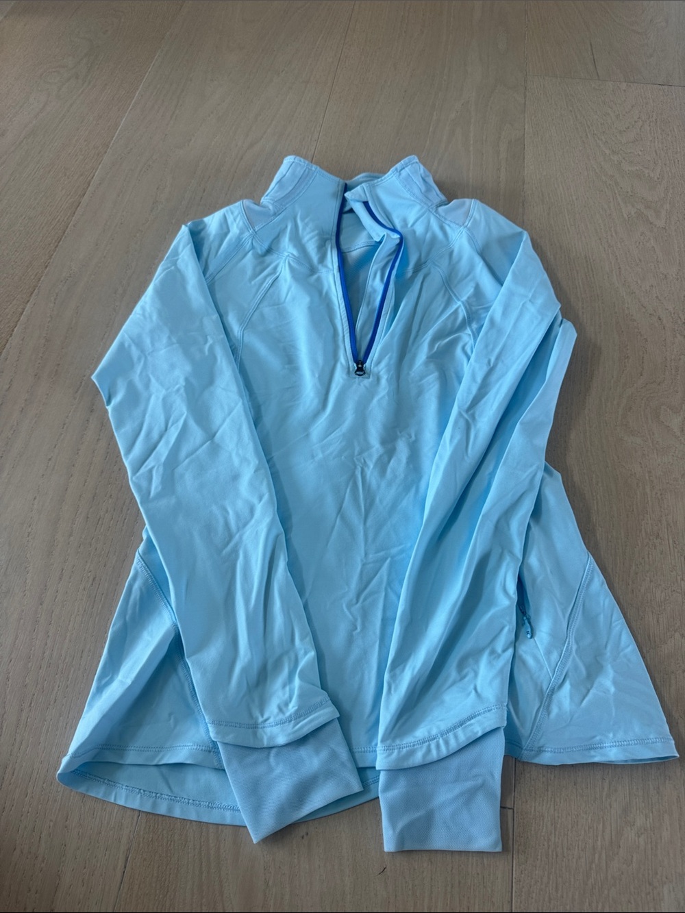 Light Blue women’s lululemon  Quarter-Zip Performance Shirt